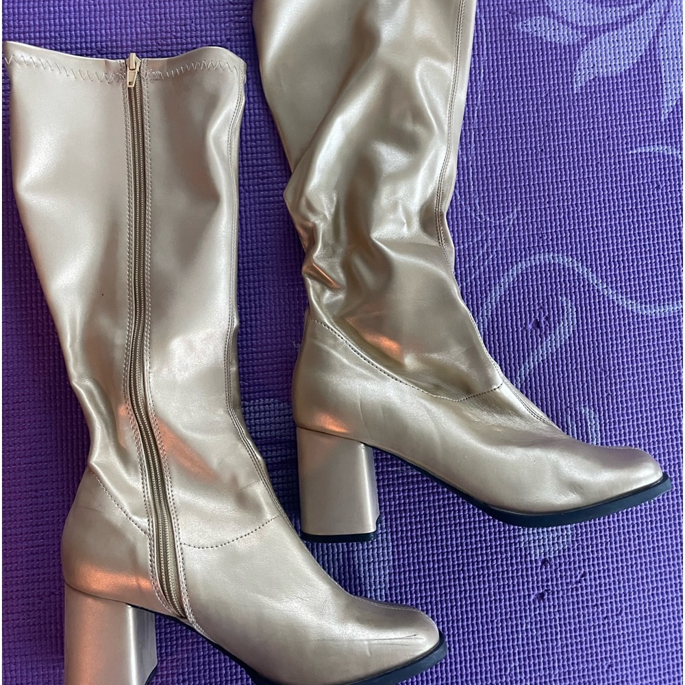 Ladies fun gold go-go boots. Great condition. Worn once. Size 8